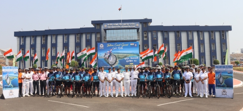 Cyclists, on a rally along the western coastline of India 