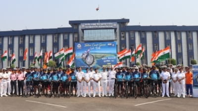 Cyclists, on a rally along the western coastline of India 