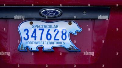 "POLAR BEAR SHAPED NO. PLATE IN NORTHWEST CANADIAN TERRIOTORIES"